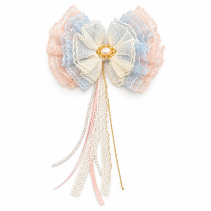 The Wrinklebottoms Ruffle Bow by Guccella in pastel lace with pearl and gold embellishment